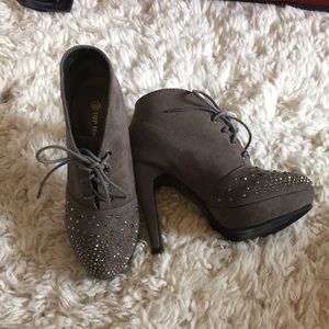 Grey laced up ankle boots